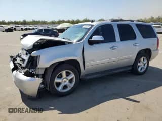 2013 Chevrolet Tahoe LTZ with VIN 1GNSKCE02DR373305, listed as a Copart auction lot 80902065 with 268,880 mi miles and Salvage title. Bid and sale history available at DreamBid. Image 1.