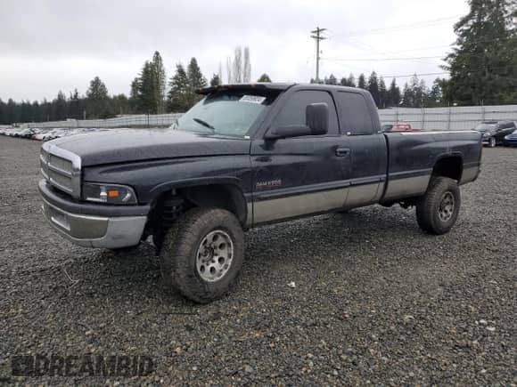 1998 Dodge 2500 with VIN 1B7KF2367WJ207684, listed as a Copart auction lot 85359924 with 284,031 mi miles and Salvage title. Bid and sale history available at DreamBid. Image 1.