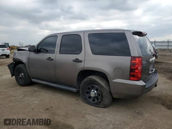 2012 Chevrolet Tahoe Commercial с VIN 1GNSK2E07CR324903, выставлен на аукционе Copart как лот 80266624 с пробегом 131 700 миль миль и Списание • Salvage title. История ставок и продаж доступна на DreamBid. Изображение 2.