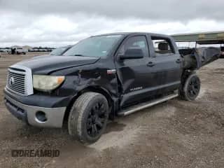 2011 Toyota Tundra z VIN 5TFEY5F1XBX106929, wystawiony jako Copart lot #73990933 z przebiegiem 153 657 mil mil oraz Szkoda całkowita • Salvage title. Historia ofert i sprzedaży dostępna na DreamBid. Obrazek 1.