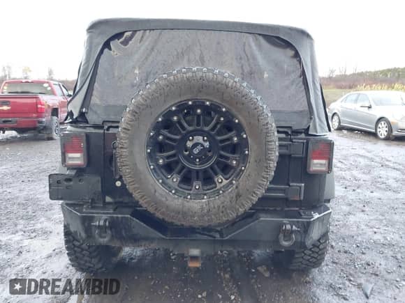 2014 Jeep Wrangler Sport z VIN 1C4AJWAG1EL327481, wystawiony jako IAAI lot #43527216 z przebiegiem 162 278 mil mil oraz . Historia ofert i sprzedaży dostępna na DreamBid. Obrazek 17.