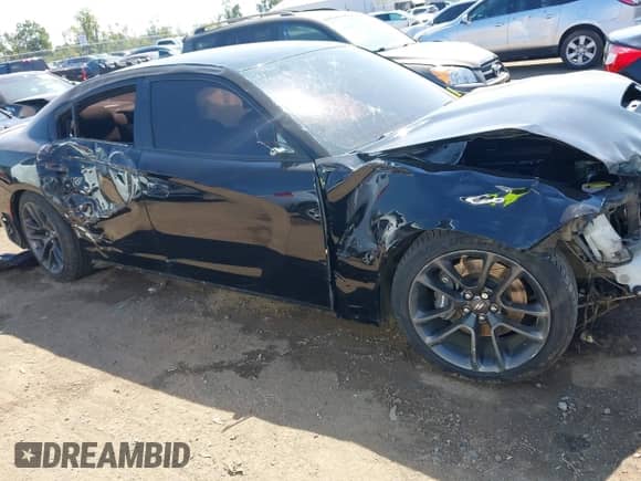 2020 Dodge Charger Scat Pack с VIN 2C3CDXGJ3LH212422, выставлен на аукционе IAAI как лот 43167450 с пробегом 77 861 миль миль и . История ставок и продаж доступна на DreamBid. Изображение 14.