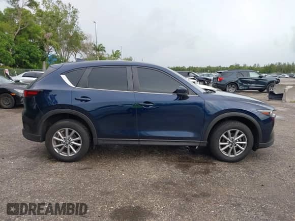 2023 Mazda CX-5 S Preferred z VIN JM3KFBCMXP0209359, wystawiony jako IAAI lot #42724622 z przebiegiem 14 682 mil mil oraz . Historia ofert i sprzedaży dostępna na DreamBid. Obrazek 13.