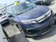 2022 Honda Pilot Touring 8-Passenger z VIN 5FNYF5H95NB017211, wystawiony jako IAAI lot #43010500 z przebiegiem 38 363 mil mil oraz . Historia ofert i sprzedaży dostępna na DreamBid. Obrazek 1.