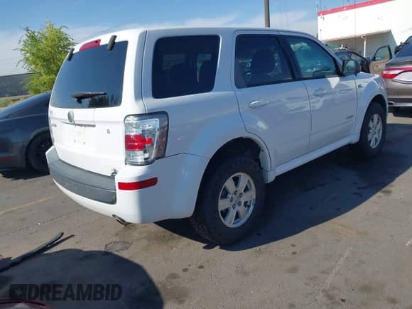 2008 Mercury Mariner with VIN 4M2CU91198KJ17082, listed as a IAAI auction lot 43138405 with 212,360 mi miles and . Bid and sale history available at DreamBid. Image 4.