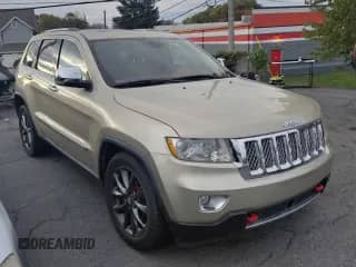 2012 Jeep Grand Cherokee Overland Summit z VIN 1C4RJFCT7CC132138, wystawiony jako Copart lot #90137995 z przebiegiem 127 611 mil mil oraz Czysty tytuł • Clean title. Historia ofert i sprzedaży dostępna na DreamBid. Obrazek 1.