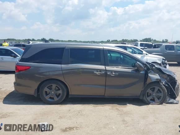 2021 Honda Odyssey EX z VIN 5FNRL6H50MB027580, wystawiony jako IAAI lot #43055794 z przebiegiem 96 516 mil mil oraz . Historia ofert i sprzedaży dostępna na DreamBid. Obrazek 12.