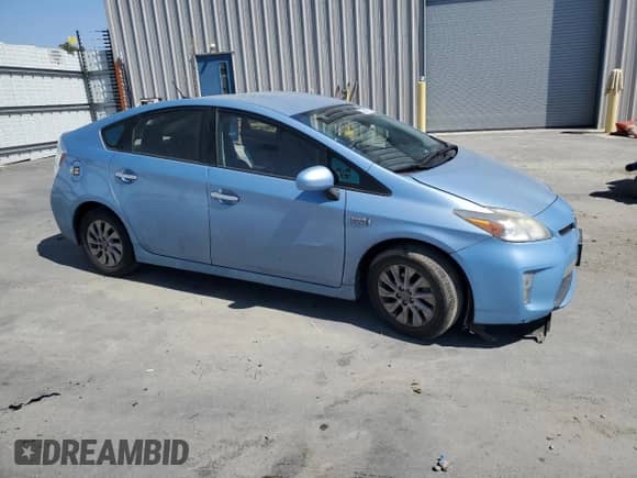 2012 Toyota Prius with VIN JTDKN3DPXC3019564, listed as a Copart auction lot 65063705 with 136,978 mi miles and Salvage title. Bid and sale history available at DreamBid. Image 4.