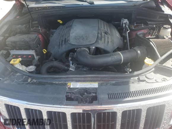 2013 Jeep Grand Cherokee Limited z VIN 1C4RJFBT9DC625984, wystawiony jako Copart lot #80372785 z przebiegiem 143 524 mil mil oraz Szkoda całkowita • Salvage title. Historia ofert i sprzedaży dostępna na DreamBid. Obrazek 12.