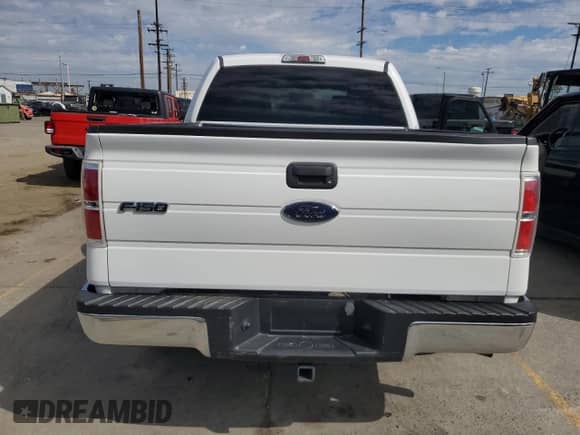 2014 Ford F-150 XLT с VIN 1FTFW1CT1EKE22892, выставлен на аукционе Copart как лот 86332765 с пробегом 14 203 миль миль и Списание • Salvage title. История ставок и продаж доступна на DreamBid. Изображение 6.