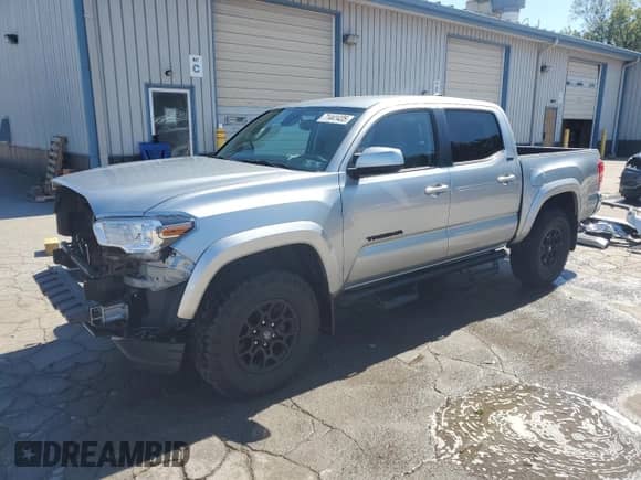 2022 Toyota Tacoma SR5 with VIN 3TMAZ5CN3NM192341, listed as a Copart auction lot 71441435 with 52,057 mi miles and Salvage title. Bid and sale history available at DreamBid. Image 1.
