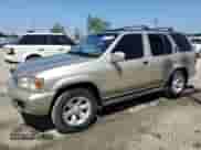 2003 Nissan Pathfinder LE z VIN JN8DR09XX3W711900, wystawiony jako Copart lot #56075895 z przebiegiem 193 712 mil mil oraz Czysty tytuł • Clean title. Historia ofert i sprzedaży dostępna na DreamBid. Obrazek 1.