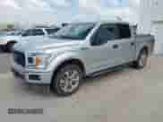 2018 Ford F-150 XL with VIN 1FTEW1CP2JFD42938, listed as a IAAI auction lot 42654180 with 119,099 mi miles and . Bid and sale history available at DreamBid. Image 2.