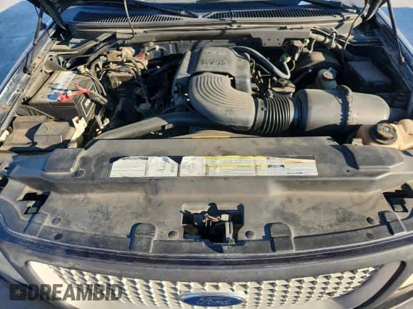 1999 Ford F-150 с VIN 1FTRX17W4XNB72337, выставлен на аукционе Copart как лот 86766575 с пробегом 183 712 миль миль и Чистый • Clean title. История ставок и продаж доступна на DreamBid. Изображение 11.