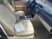 2015 Toyota Camry LE with VIN 4T1BD1FK8FU165173, listed as a IAAI auction lot 42662431 with 297,983 mi miles and . Bid and sale history available at DreamBid. Image 5.