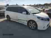 2012 Toyota Sienna SE with VIN 5TDXK3DC1CS270502, listed as a Copart auction lot 81154565 with 93,407 mi miles and Salvage title. Bid and sale history available at DreamBid. Image 4.