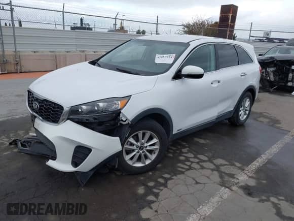 2019 Kia Sorento LX with VIN 5XYPGDA53KG456969, listed as a IAAI auction lot 42057524 with 83,828 mi miles and . Bid and sale history available at DreamBid. Image 2.