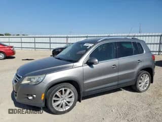 2011 Volkswagen Tiguan S с VIN WVGBV7AX9BW513466, выставлен на аукционе Copart как лот 84452215 с пробегом 128 874 миль миль и Чистый • Clean title. История ставок и продаж доступна на DreamBid. Изображение 1.
