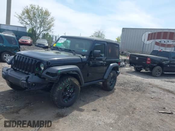 2023 Jeep Wrangler Sport with VIN 1C4HJXAG9PW674630, listed as a IAAI auction lot 42127428 with 27,064 mi miles and . Bid and sale history available at DreamBid. Image 2.
