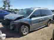 2004 Dodge Caravan SXT with VIN 2D4GP44LX4R615773, listed as a Copart auction lot 65027385 with 48,993 mi miles and Salvage title. Bid and sale history available at DreamBid. Image 1.