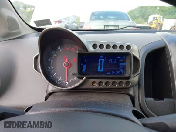 2012 Chevrolet Sonic LS with VIN 1G1JB6SH2C4114902, listed as a IAAI auction lot 42166155 with 140,977 mi miles and . Bid and sale history available at DreamBid. Image 7.