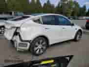 2020 Tesla Model Y Long Range с VIN 5YJYGDEE6LF023427, выставлен на аукционе Copart как лот 81877945 с пробегом 52 307 миль миль и Списание • Salvage title. История ставок и продаж доступна на DreamBid. Изображение 3.