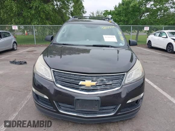 2014 Chevrolet Traverse LS z VIN 1GNKVFKD2EJ202585, wystawiony jako IAAI lot #42585179 z przebiegiem 107 460 mil mil oraz . Historia ofert i sprzedaży dostępna na DreamBid. Obrazek 12.