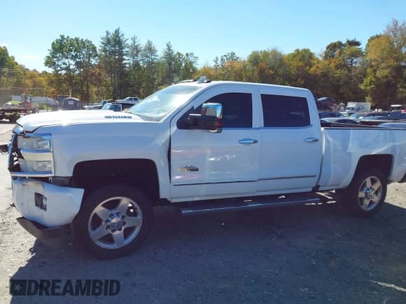 2016 Chevrolet Silverado 2500HD High Country with VIN 1GC1KXE83GF218284, listed as a IAAI auction lot 43360216 with 124,600 mi miles and . Bid and sale history available at DreamBid. Image 14.