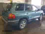 2002 Hyundai Santa Fe GLS z VIN KM8SC13D82U337771, wystawiony jako Copart lot #55555785 z przebiegiem 84 665 mil mil oraz Szkoda całkowita • Salvage title. Historia ofert i sprzedaży dostępna na DreamBid. Obrazek 3.