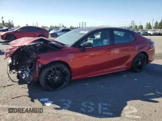 2021 Toyota Camry Hybrid XSE with VIN 4T1K31AK6MU022259, listed as a Copart auction lot 70696655 with 155,767 mi miles and Salvage title. Bid and sale history available at DreamBid. Image 1.