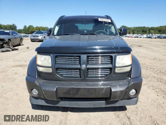 2011 Dodge Nitro Heat z VIN 1D4PT4GK5BW589795, wystawiony jako Copart lot #70257423 z przebiegiem 140 599 mil mil oraz Szkoda całkowita • Salvage title. Historia ofert i sprzedaży dostępna na DreamBid. Obrazek 5.