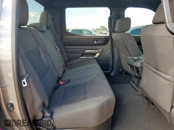 2025 Toyota Tundra SR with VIN 5TFLA5AB2SX044616, listed as a Copart auction lot 82146585 with 12,721 mi miles and Salvage title. Bid and sale history available at DreamBid. Image 10.
