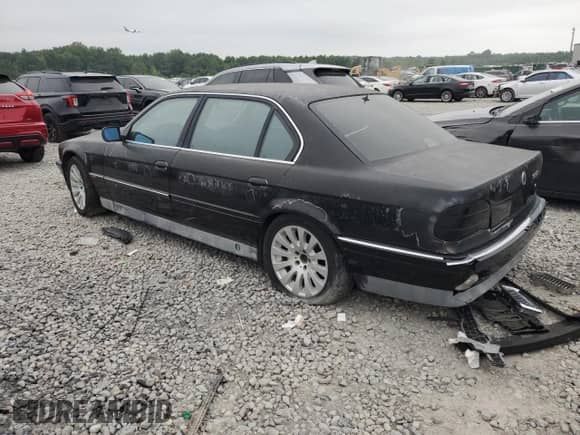 1995 BMW 7 Series with VIN WBAGK2321SDH66428, listed as a Copart auction lot 71174444 with Not provided miles and Salvage title. Bid and sale history available at DreamBid. Image 2.