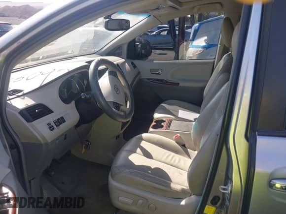 2013 Toyota Sienna XLE with VIN 5TDYK3DC6DS337052, listed as a IAAI auction lot 43353095 with 221,335 mi miles and . Bid and sale history available at DreamBid. Image 5.