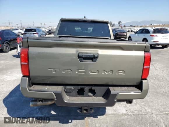 2025 Toyota Tacoma SR5 with VIN 3TMLB5FNXSM032770, listed as a Copart auction lot 67279205 with 8,240 mi miles and Salvage title. Bid and sale history available at DreamBid. Image 6.
