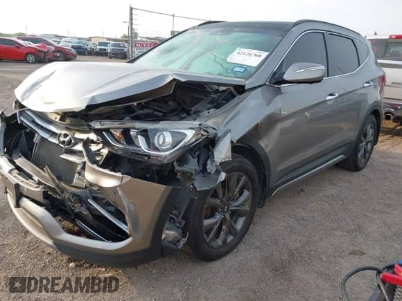 2018 Hyundai Santa Fe Ultimate с VIN 5NMZWDLAXJH100108, выставлен на аукционе IAAI как лот 42126768 с пробегом 68 325 миль миль и . История ставок и продаж доступна на DreamBid. Изображение 17.