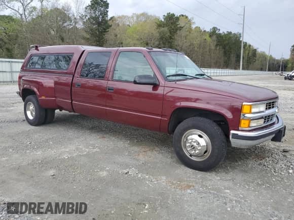 1996 Chevrolet Silverado 3500 with VIN 1GCHC33J4TF013660, listed as a Copart auction lot 49332785 with 104,424 mi miles and Clean title. Bid and sale history available at DreamBid. Image 4.