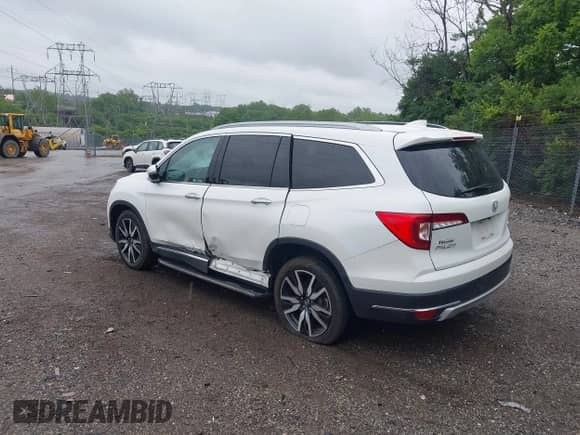 2021 Honda Pilot Elite с VIN 5FNYF6H02MB056053, выставлен на аукционе IAAI как лот 42340995 с пробегом 60 358 миль миль и . История ставок и продаж доступна на DreamBid. Изображение 3.