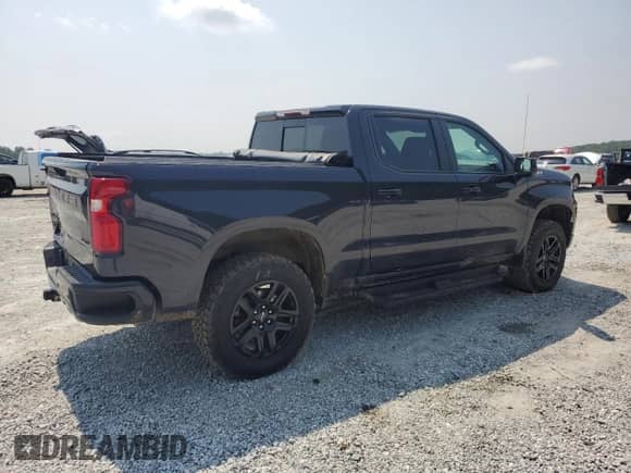 2022 Chevrolet Silverado 1500 RST with VIN 3GCUDEET3NG662986, listed as a Copart auction lot 59013585 with 26,141 mi miles and Salvage title. Bid and sale history available at DreamBid. Image 3.