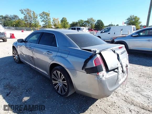 2014 Chrysler 300 S with VIN 2C3CCABT5EH118814, listed as a IAAI auction lot 43351388 with 152,597 mi miles and . Bid and sale history available at DreamBid. Image 3.