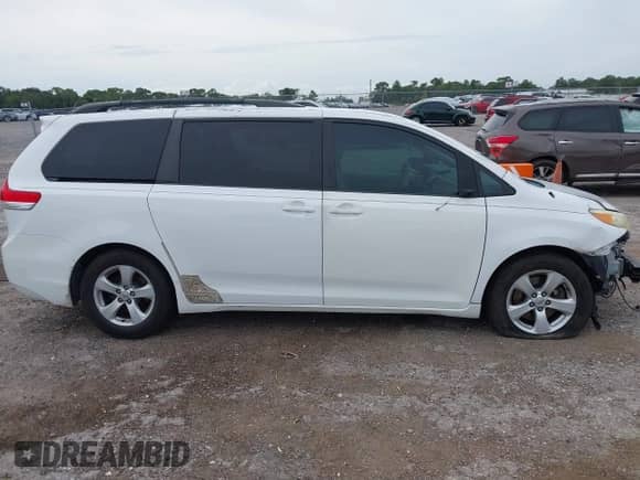 2012 Toyota Sienna LE AAS with VIN 5TDKK3DC8CS259698, listed as a IAAI auction lot 43249354 with 340,370 mi miles and . Bid and sale history available at DreamBid. Image 13.