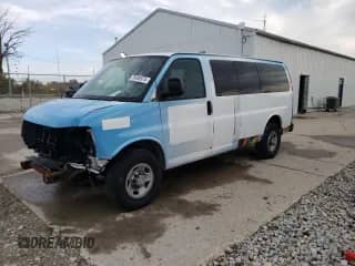2013 Chevrolet Express Passenger 1LT with VIN 1GAZGYFG5D1190358, listed as a Copart auction lot 75496574 with 114,340 mi miles and Salvage title. Bid and sale history available at DreamBid. Image 1.