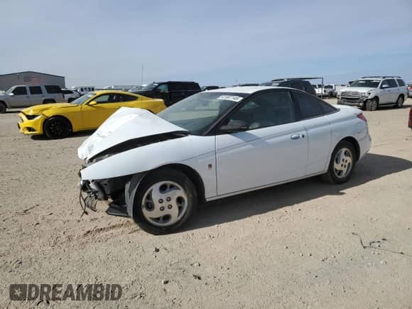 2002 Saturn SC with VIN 1G8ZY12772Z164242, listed as a Copart auction lot 46911695 with 216,124 mi miles and Salvage title. Bid and sale history available at DreamBid. Image 1.