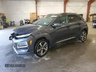 2018 Hyundai Kona Ultimate с VIN KM8K5CA50JU112857, выставлен на аукционе Copart как лот 53296535 с пробегом 84 077 миль миль и Списание • Salvage title. История ставок и продаж доступна на DreamBid. Изображение 1.