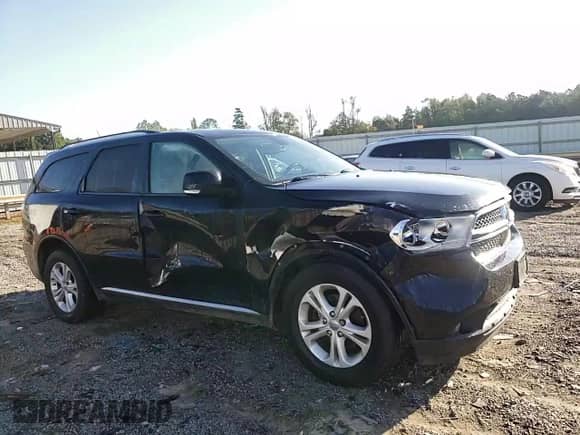 2012 Dodge Durango Crew with VIN 1C4RDJDG1CC163588, listed as a Copart auction lot 81885615 with 288,814 mi miles and Salvage title. Bid and sale history available at DreamBid. Image 14.