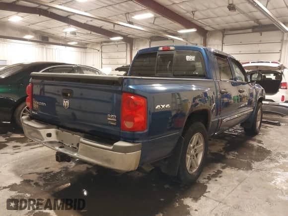 2008 Dodge Dakota Laramie with VIN 1D7HW58N08S637068, listed as a IAAI auction lot 41542177 with 171,058 mi miles and . Bid and sale history available at DreamBid. Image 4.
