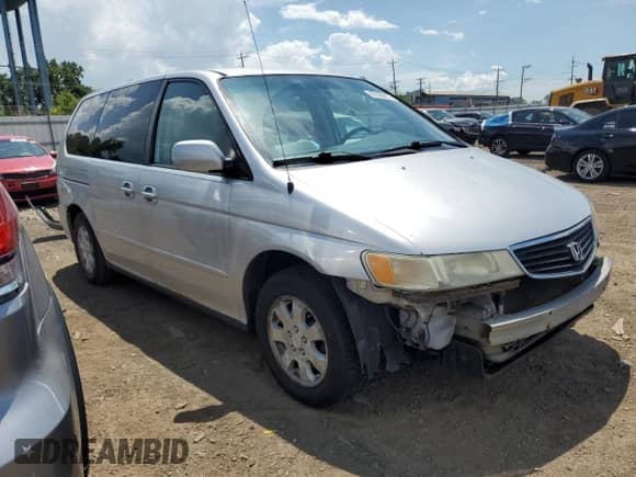 2001 Honda Odyssey LX с VIN 2HKRL185X1H616779, выставлен на аукционе Copart как лот 62356215 с пробегом Не указан миль и Списание • Salvage title. История ставок и продаж доступна на DreamBid. Изображение 4.