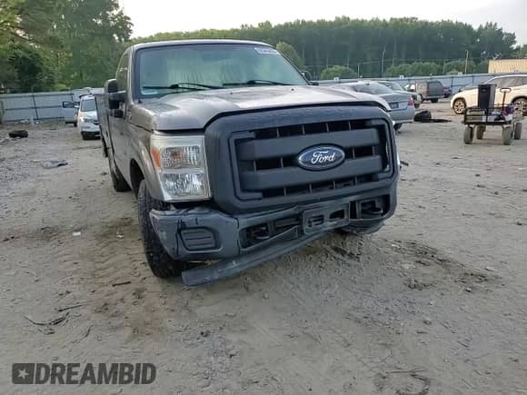 2012 Ford F-250 XL с VIN 1FDBF2A60CEC72962, выставлен на аукционе Copart как лот 62343435 с пробегом Не указан миль и Списание • Salvage title. История ставок и продаж доступна на DreamBid. Изображение 13.