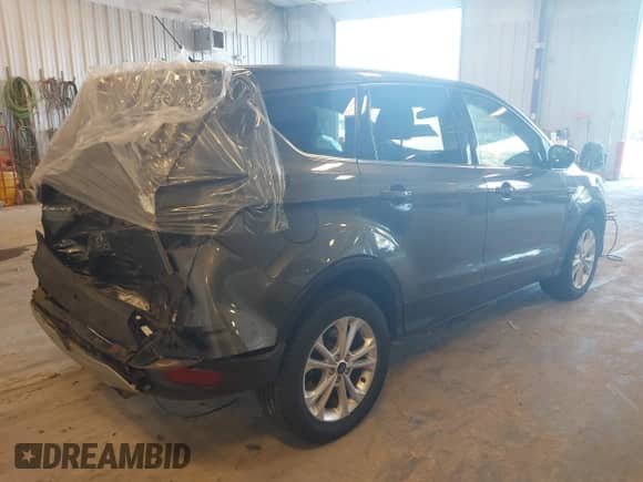 2017 Ford Escape SE with VIN 1FMCU9GD0HUD09465, listed as a IAAI auction lot 43133238 with 78,082 mi miles and . Bid and sale history available at DreamBid. Image 4.