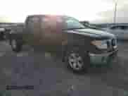 2009 Nissan Frontier SE with VIN 1N6AD09W39C420747, listed as a Copart auction lot 47236815 with 191,975 mi miles and Salvage title. Bid and sale history available at DreamBid. Image 4.